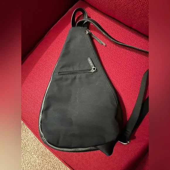 NWOT The Sak Black Leather Sling Backpack - New 5 pocket Leather 1 side canvas. - Picture 11 of 16